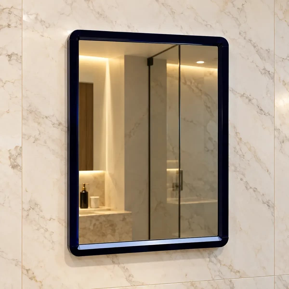Rectangular wall mirror with a dark edge and a bathroom reflection.