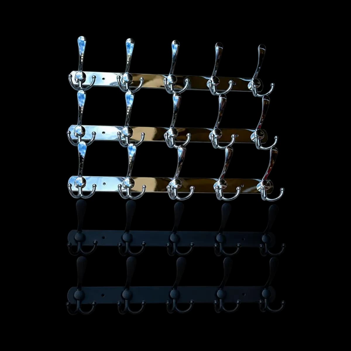 Several wall hook strips in reflective, gold-coloured, dark brown and black appearances.