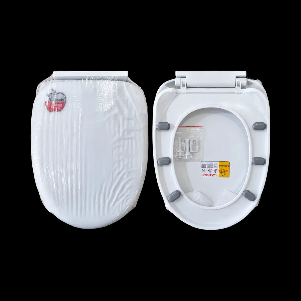 White toilet seat shown from the top and underside in one image, with protective wrapping retained.