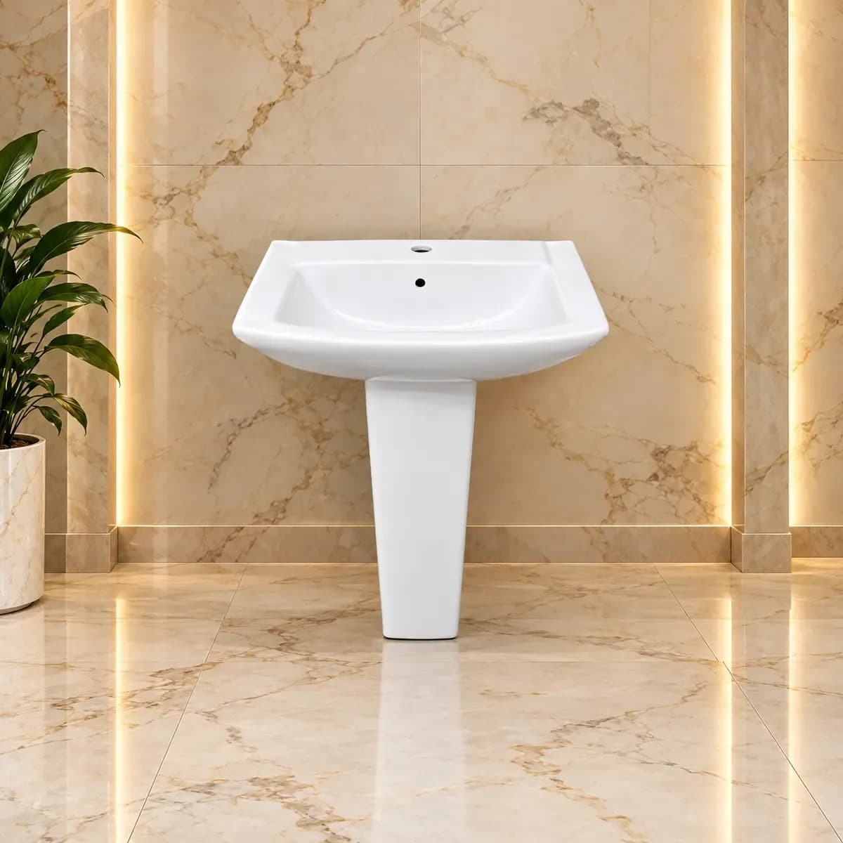 White rounded basin with a raised rear rim and a tapering pedestal.