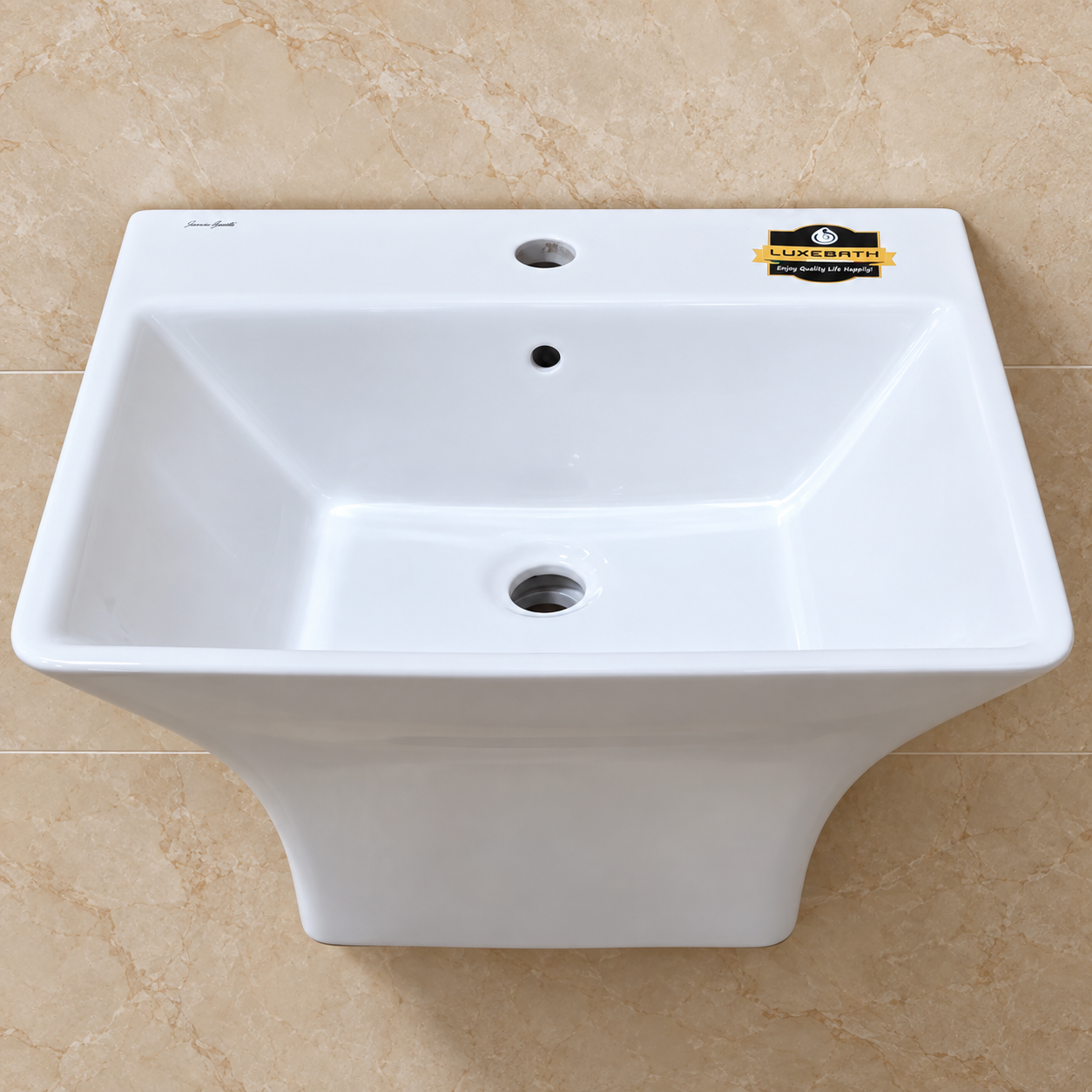 White square wall basin with curved tapering underside